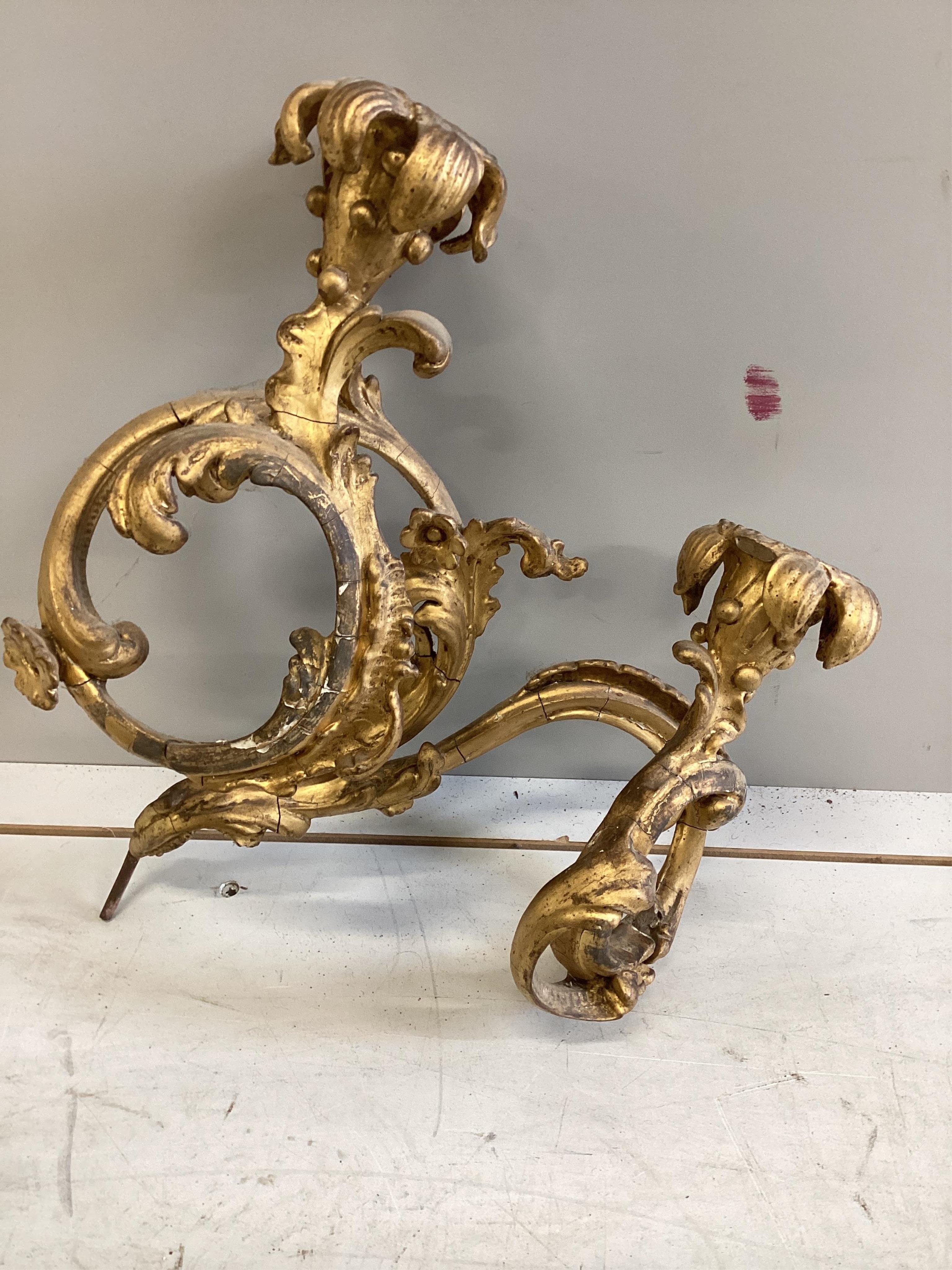 A pair of Victorian giltwood and composition twin branch wall lights (from a girandole), height 42cm. Condition - fair